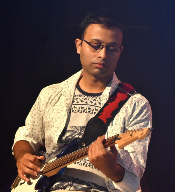 guitar-instructor-live-performance Guitar instructor from The Curious Guitarist performing electric guitar on stage